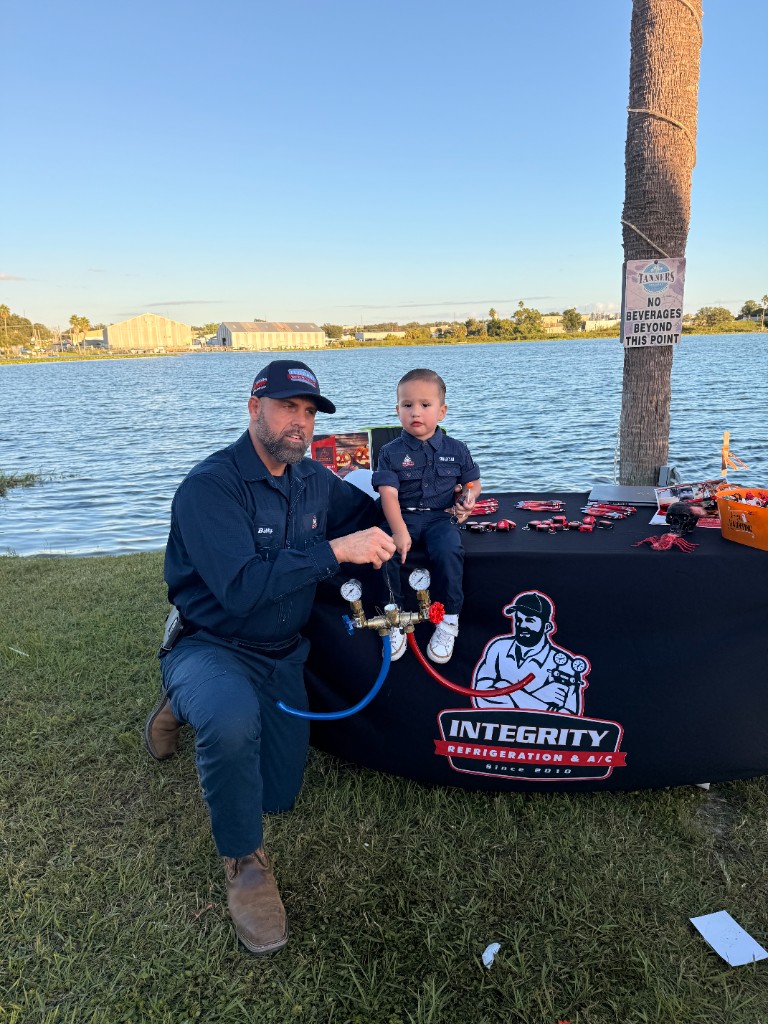 Integrity technicians in branded uniforms